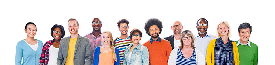 A group of people standing together in front of a white wall.